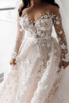 Replications of haute couture sheer long sleeve plus size wedding gowns for less!