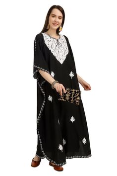 Kashmiri Aari Embroidered Cotton Kaftan.A Stunningly Marvellous Kaftan.This Kaftan Is Made Of Cotton Its Embroidered  With White Colour.Breezy Cotton Bohemian Maxi Dresses Or Caftans Are The Perfect Style Statement For Summer, Spring Days, Beach Holidays.The Embroidery Done On This Is A Traditional Kashmiri Embroidery Known As 'Aari Work''. Product Details - Condition: Brand New - Handmade - Style: Kaftan - Fabric: soft Cotton - Embroidery: Kashmiri Aari Embroidery - Length: 54'' Inch - Chest: 6 Georgette Kaftan With Resham Embroidery, Diwali Georgette Kaftan With Resham Embroidery, Eid Dabka Embroidered Georgette Kaftan, Eid Dabka Embellished Georgette Kaftan, Bohemian Georgette Kurta For Summer, Floor-length Resham Embroidered Kaftan For Diwali, Diwali Floor-length Kaftan With Resham Embroidery, Summer Bohemian Georgette Kurta, Embroidered Georgette Kaftan For Summer