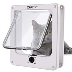 a cat is looking out the window of a white wall mounted litter box that holds a gray cat