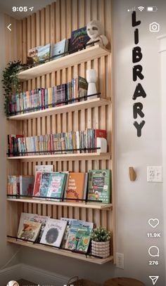 a wooden book shelf with books on it