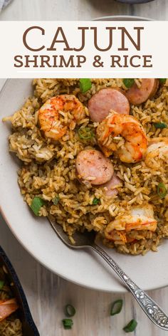 a white plate topped with shrimp and rice