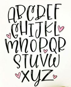 some type of lettering with hearts on the bottom and lower letters in black, white and pink