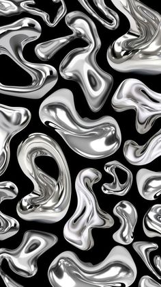 an abstract silver background with black and white swirls in the center, as if it were liquid or gas