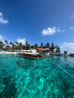 a boat in the water near a beach