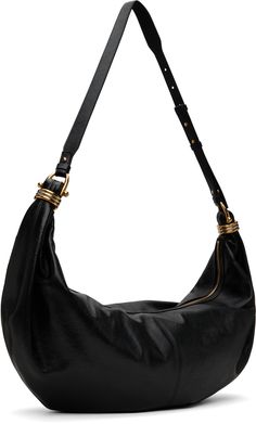 LWG-certified grained calfskin shoulder bag in black. · Adjustable crossbody strap · Gold-tone logo stamp at face · Gathering and graphic hardware at sides · Zip closure · Patch pocket at interior · Calfskin suede lining · Gold- and silver-tone hardware · H13 x W26 x D2 Supplier color: Black Bracelet Bag, Large Bracelet, Logo Stamp, Crossbody Strap, Gold And Silver, Patch Pocket, Calf Skin, Chloe, Silver Tone