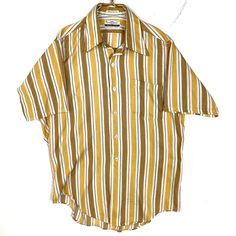 Vintage Grant Crest Bowling Shirt Medium Striped Button Up Short Sleeve 80s Size/Measurements (Based in inches) Size - Medium Pit to pit - 23" Length - 30" Condition / Details Stains found on front and on right sleeve Combined Shipping: We provide combined shipping, please contact us for a quote Brown Shirt With Button Closure For Daywear, Retro Short Sleeve Shirt With Camp Collar, Retro Button-up Summer Shirt, Retro Button-up Shirt For Summer, Retro Camp Collar Shirt For Spring, Retro Button-up Short Sleeve Shirt For Spring, Spring Retro Camp Collar Shirt, Brown Shirt With Buttons For Daywear, Brown Buttoned Shirt For Daywear