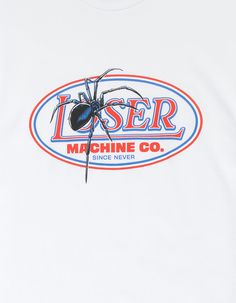 a white t - shirt with a spider on the front and an image of a machine co logo