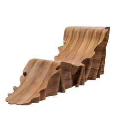 two pieces of wood sitting on top of each other