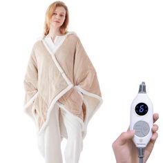 PRICES MAY VARY. WEARABLE HEATED PONCHO THROW - Westinghouse wearable heated blanket 50" x 60" keeps you warm and cozy. 7”*9” Deep Pockets in front of the wearable blanket, keep your hands warm, can place your phone, snacks, remote control or else you want, anytime, anywhere ETL AND FCC CERTIFIED - 6 Heating levels for different people needs. 2-10 Hours time setting, overheat protection ensure your safety during normal use. Please read the instructions carefully before use to avoid local overhea Shawl With Pockets, Heated Throw, Snuggle Blanket, Poncho Shawl, People Clothes, Heated Blanket, Plaid Throw, Hoodie Blanket, Blanket Wrap