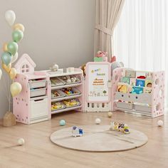 a child's play room with toys and decorations on the floor in front of it