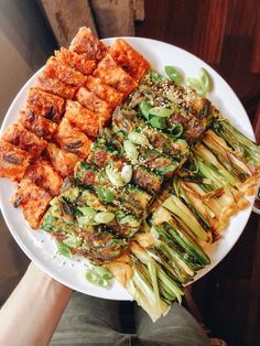 a white plate topped with different types of food