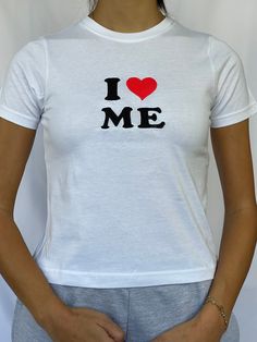 "I heart me baby tee 100% cotton available in sizes xs - xl - see photo 5 for sizing Model is wearing  size S and is a 6/8 - For reference, model is 5'5 with 31\" bust and 26\" waist baby tee with i love / heart me embroidery" Cute Fitted T-shirt With Heart Graphic, Summer Cotton Top With Heart Print, Cute Cotton Tops With Heart Print, Cute Cotton Tops With Heart Graphic, Cute Cotton T-shirt With Heart Graphic, Cotton Tops With Heart Graphic And Short Sleeves, Trendy Cotton Tops With Heart Print, Fitted Heart Print T-shirt With Crew Neck, Fitted Cotton Top With Heart Print