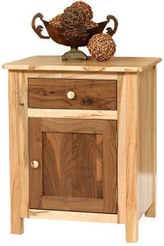 a wooden cabinet with two drawers and a bowl on top