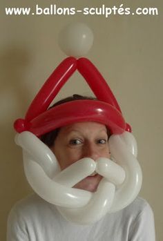 a woman with an inflatable mustache on her head