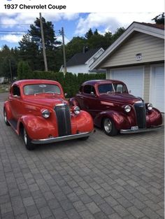 two classic cars parked next to each other