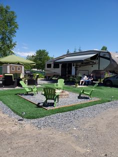 an rv park with lawn chairs and tables