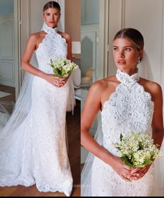 a woman in a white wedding dress holding a bouquet and wearing a bridal gown