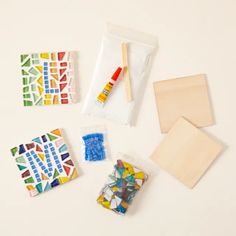 some crafting supplies are laid out on a table