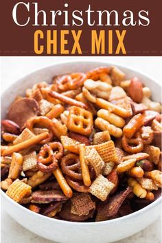 christmas chex mix in a white bowl with the title above it and text overlay