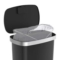 a black trash can with its lid open and plastic wrap in the bottom compartment, on a white background