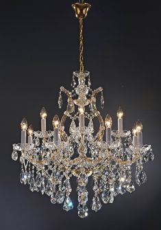 a chandelier with many lights hanging from it