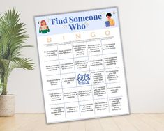 a poster with the words find someone who is on it next to a potted plant