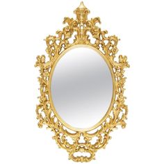 an ornate gold mirror on a white background