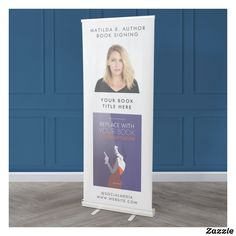 a banner stand with an image of a woman's hand on it