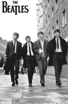 black and white photograph of men in suits walking down the street with buildings behind them