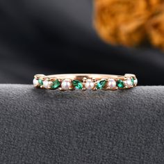 Pearl Emerald Wedding Band Women Rose Gold Marquise Emerald Cluster Band Pearl Matching Band Akoya Pearl Ring Half Eternity Stackable Description: * Handmade, high-quality item * Material: SOLID 14K/18K GOLD ( can be made in yellow/white/rose gold ) ♡ Stone 1: Natural Emerald Or Lab Emerald Size: 1.5*3mm ♡ Stone 2: Natural Akoya Pearl, 2.0mm ♡ Cut - Round Cut ♡ Band Width: Around 1.5mm Visit my shop for more jewelry: https://www.etsy.com/shop/FlippedRing PRODUCTION We are jewelry artisans and ma Emerald Band Ring Gold, Pearl And Emerald Engagement Ring, Pearl Emerald Ring, Fine Emerald Wedding Ring, Emerald Pearl Ring, Luxury Rose Gold Emerald Ring For Wedding, Heirloom Style Emerald Ring For Wedding, Heirloom Emerald Ring For Wedding, May Birthstone, Elegant Stackable Emerald Ring For Wedding