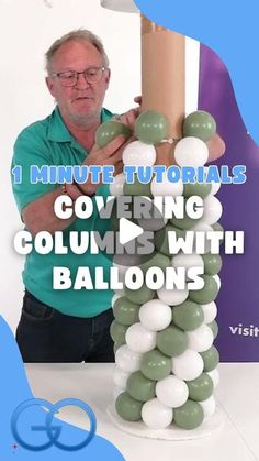 a man standing next to a tall column made out of balloons with the words, 1 minute tutors covering columns with balloons