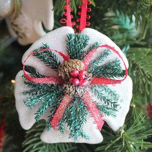 an ornament hanging from a christmas tree