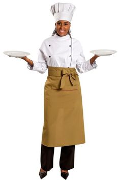 a woman wearing an apron and holding two plates in one hand while smiling at the camera