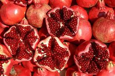 the pomegranates are cut in half and ready to be picked up