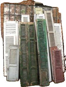 an image of old shutters stacked on top of each other