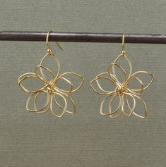 Gold Wire Wrapped Flowers on gold filled ear wires - Gold plated brass flowers - Flowers measure 32mm   - Gold Filled Wires - Lightweight and Comfortable Here is the link to the identical earrings in silver instead of bronze: https://mosaicsunstudio.etsy.com/listing/1648730710 Wire Wrapped Flower Earrings, Cute Wire Earrings, Butterfly Wire Earrings, Flower Wire Earrings, Gold Wire Earrings, Wire Flower Earrings, Wire Wrapped Flower, Wrapped Flowers, Brass Flowers