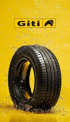 an image of a car tire in the water on a yellow background that says giti