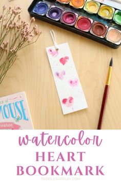 We love how easy and fun this Watercolor Fingerprint Heart Bookmark is to make! It comes out super cute with the hearts made from child’s fingerprints!  #valentinesdaycrafts #bookmark #diybookmark #watercolorbookmark #heartcrafts #kidscrafts #preschoolcrafts #fingerprintcrafts #watercolorbookmark