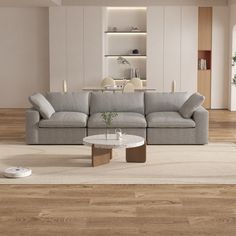 a living room filled with furniture on top of a hard wood floored flooring