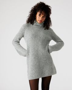 The ABBIE sweater dress is expertly crafted with a turtleneck and flare sleeves and offers a relaxed yet stylish fit. The soft brushed material provides warmth and comfort, making it the perfect mini dress for cooler weather. Elevate your wardrobe with this versatile and chic pullover dress. Mini sweater dress Turtleneck pullover style Flared long sleeves 98% polyester 2% elastane Hand wash Carla is 5ft 9in and is wearing a size large Lilia is 5ft 9in and is wearing a size small Imported Flared Sleeve Dress, Mini Sweater, Flare Sleeve Dress, Turtleneck Pullover, Flare Long Sleeve, Flare Sleeves, Turtleneck Sweater Dress, Mini Sweater Dress, Dress Mini