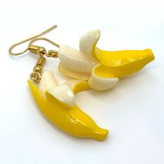 These banana earrings promise a lot of appeal. Made of Acrylic Resin they're both colorful and light and will brighten up your wardrobe. Banana Earrings, Peeled Banana, Banana Candy, Resin Earring, Food Earrings, Fun At Work, Strawberry Shortcake, Colorful Fashion, Birthday Party Themes