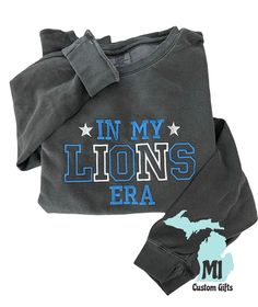 In my Lions Era Embroidered apparel! Select below if you would like a t-shirt, long sleeve or crew neck in the fan favorite comfort colors apparel!  6.4 oz., 100% Ring Spun U.S. Cotton 31/1 Comfort Colors styles are garment dyed for that lived in feel and almost no shrinkage at home.  Made with 100% soft ring spun cotton fabric and cotton threads 1x1 rib collar, cuffs and waistband Rolled forward shoulder Relaxed fit, seamless body Signature twill label and back neck tape Complete the look with matching bottoms: 1468 and 1469 Proud member of the U.S. Cotton Trust Protocol Made with OEKO-TEX certified low-impact dyes Salt free, clean pigment dye colors Detroit Lions Shirt, Embroidered Apparel, Lion Gifts, Lion Shirt, Salt Free, Dye Colors, Shirt Diy, Embroidered Clothes, Soft Ring