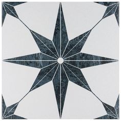 a black and white tile with an intricate design