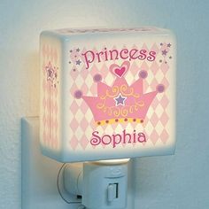 a princess night light with the name sophiia on it and a pink crown