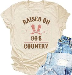 PRICES MAY VARY. 【Feature】Women western shirt,raised on 90's letter print tees,cowgirls country music tee tops, farm shirt,southern shirt. Round neck, retro vintage western design, great fit, and high-quality material texture. 【Style】Country music western tee, casual southern farm life top blouse. It's a perfect gift idea for mom, wife, daughter,sister, grandma, girlfrend, and friends. 【Occasion】This country music lover gift shirt is great to match with skinny leggings, jeans, shorts, skirts, bo Concert Outfits Casual, Raised On 90s Country, Cowgirl Bachelorette Parties, Music Tshirt, 90s Country, Western Top, Country Tees, Western Tee, Letter Print Tee