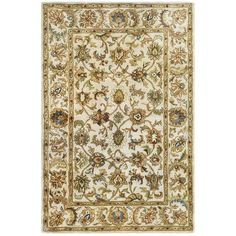 a white rug with an ornate design on the front and back side, in various colors