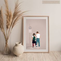 two people standing next to each other in front of a white vase with dried grass