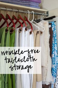 an organized closet with clothes hanging on hooks and the words wrinkle - free tablecloth storage above it