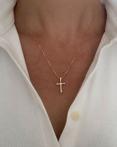 Gold Cross Necklace, Waterproof jewelry, Cross Necklace for women, gift for her, graduation gift, baptism gift, CZ cross necklace, birthday  Dainty Cross Necklace MADE TO LAST  * 14k gold filled Cross pendant 20mm x 12mm * Cubic Zirconia Stones * Stainless Steel chain - water resistant for long lasting wear *Chose your perfect length *Shown at 18" on a size Small model for reference Water & tarnish resistant!  Gold filled jewelry is durable & tarnish resistant.  Yes, you can get them wet! Filled Jewelry Cross Necklace, Cross Necklace For Women, Dainty Cross Necklace, Jewelry Cross, Gold Cross Necklace, Waterproof Jewelry, Baptism Gifts, Gold Cross, Gold Filled Jewelry