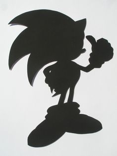 shadow of sonic the hedgehog holding a banana in front of a white background,